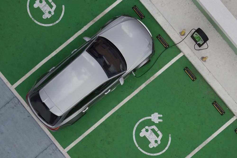 Electric vehicle being charged